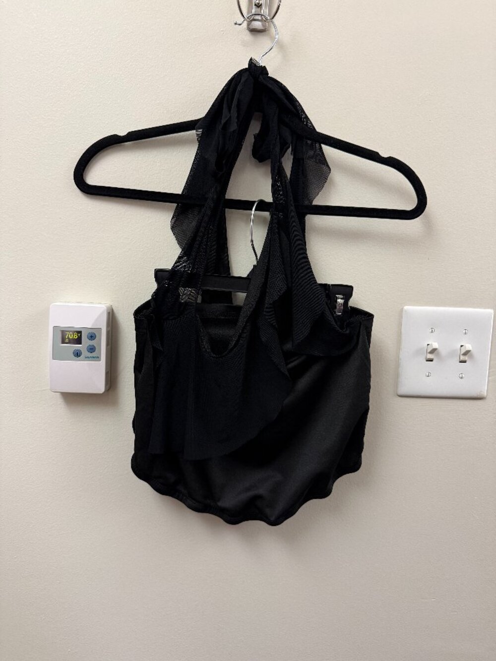 Black asymmetrical halter top